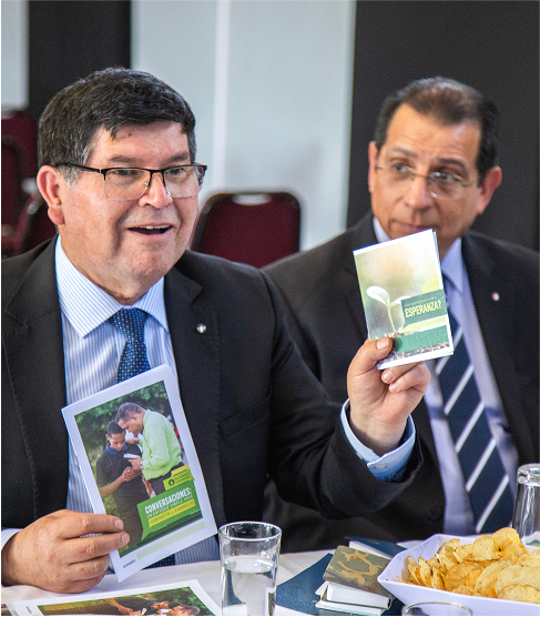 Man holding up ministry endowment