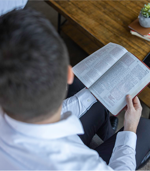 Man reading bible