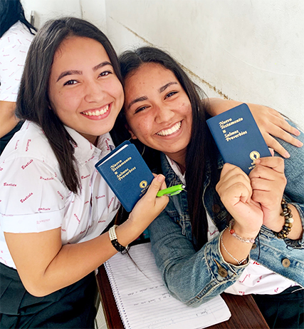 Two students at a public school in El Salvador with their Testaments